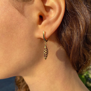 Grain, mismatched ear pendants